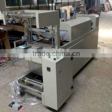 Fully automatic shrink film packaging machine