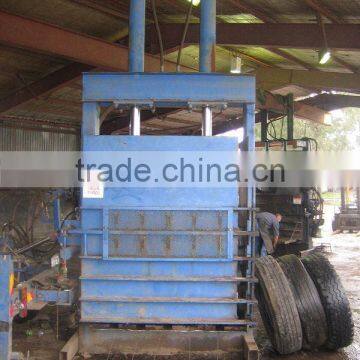 Waste tyre baler machine