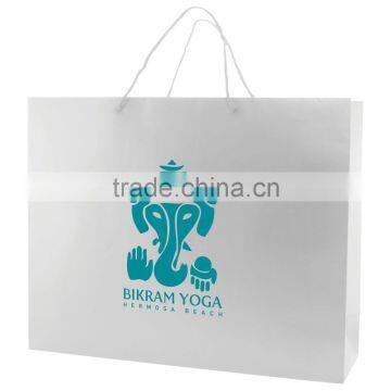 White Matte Laminated Eurotote Shopping Bag - Features Cardboard Bottom, Dimensions Are 20" x 6" x 16" and Comes With Your Logo.
