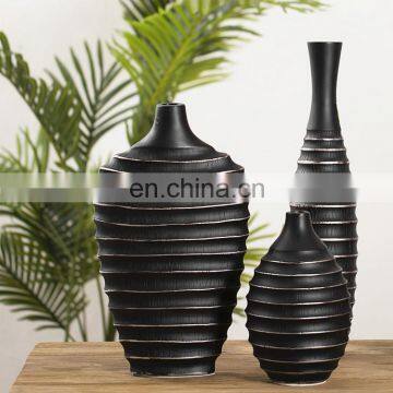 Support customized wholesale cheap unique handmade design black wine bottle shape resin vase