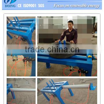 Nonelectric tyre doubling unpacking machine