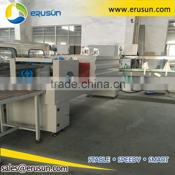 Automatic shrink wrapping machine with shrink tunnel