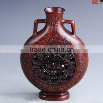 wooden carved decorative bottle