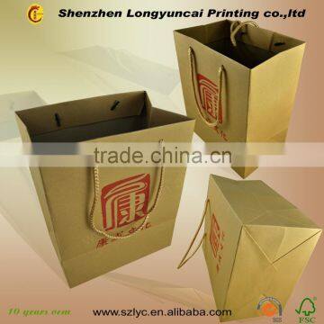 Chinese Factory OEM Food Packaging Round Hole Handle Custom Paper Bag photo-4