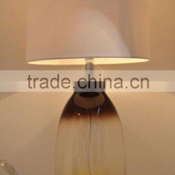 2016 new design hot selling in Singapore table lamp glass big bottle shaped with white cylinder fabric lamp shade