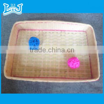 Chinese traditional handyman making handicraft basket fruit basket with net cover made by hand