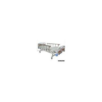 Manual double-rocker care bed