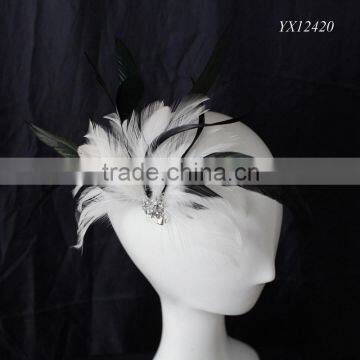 White/black feather fascinator