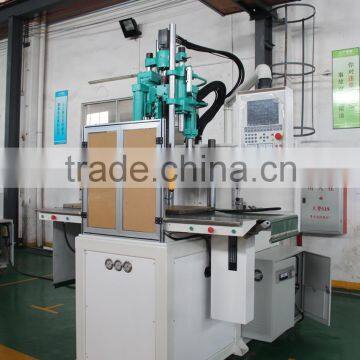 Small double slides vertical injection machine