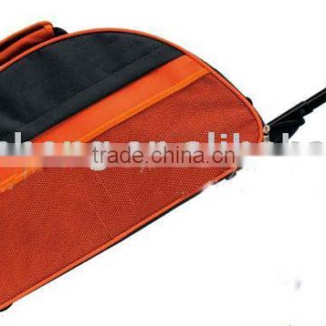 orange trolley bag (traveling bag, luggage)