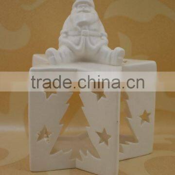 white ceramic tealight candle holder with santa claus shape