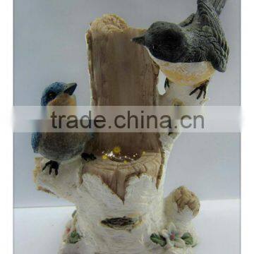 Polyresin antique bird figurine