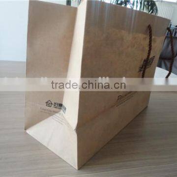 Custom design paper bag with different handle types of kraft thread paper