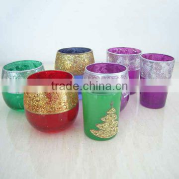 golden and silver dical glass wax holder