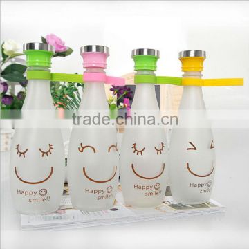 2014year wholesale lovely smiling face frosted glass bottle with ligature student carrying bottles