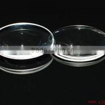 Magnifying convex glass lens