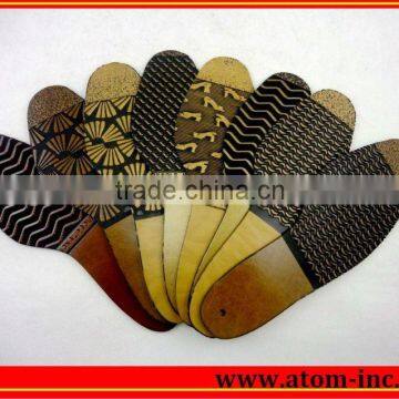 Embossed rubber sole sheet from Atom Shoes Material Limited