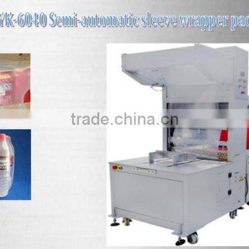 Sleeve wrapper packaging machine Semi-automatic sleeve wrapper packing machine