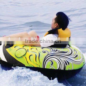 Inflatable towable snow skiing water tube ring