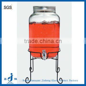 Beverage store large glass jar with tap