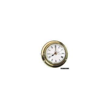 Art. 2147 Clock set into brass marine case