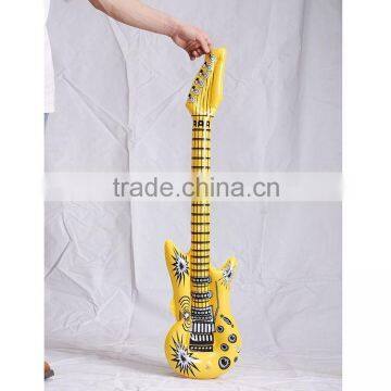 vivid yellow plastic inflatable electric guitar