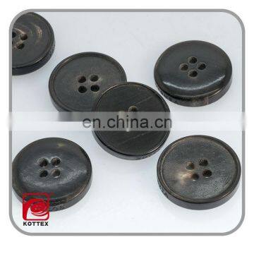 4 holes Cow Horn button with side logo engraved for coats Button Factory