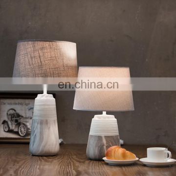 Unique custom barrel shape large ceramic base cheap office table lamp for hotel bedside