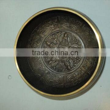 brass tibetan singing bowls with holy signs