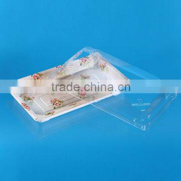 Colorful disposable plastic sushi, cake tray with clear separate lid