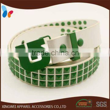 PU leather belt with a huge amount of coated decorative rivets