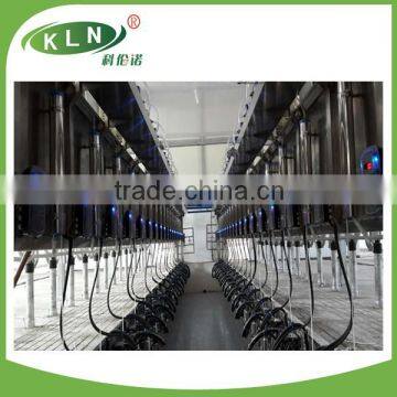 Automatic paralleling milking parlor with quick released canopy frame