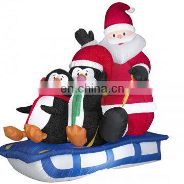 2014 outdoor inflatable christmas funny and cute penguin and santa claus in sleign,xmas sleign