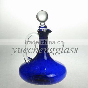 Blue glass wine decanter with stopper