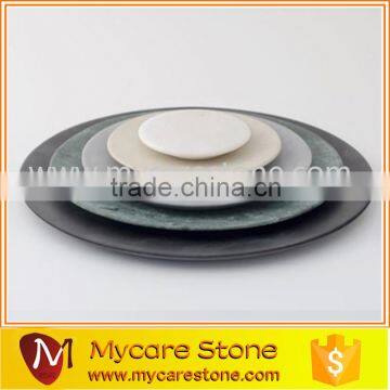 natural marble round serving trivet and dishes