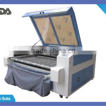 Auto feeding laser paper cutter fabric/paper roller