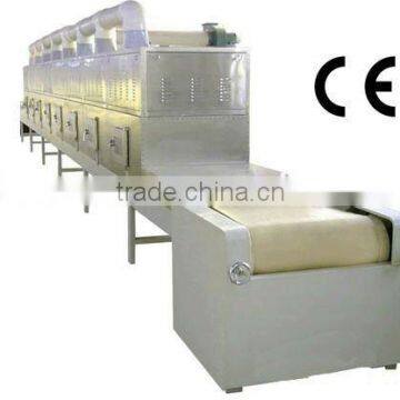 Continuous belt type paper products microwave dryer