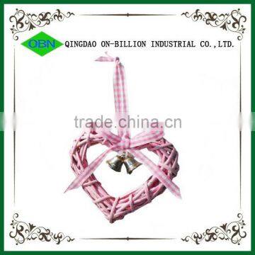 Hanging wicker rattan heart with bells
