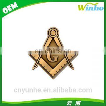 Winho antique gold die struck masonic badge