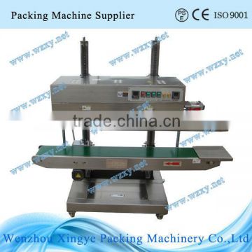 Continuous vertical bag foil sealing machine