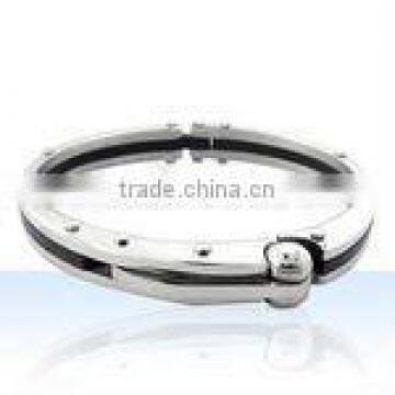 Stainless steel and rubber accent bangle bracelet with high polish