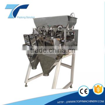 Double discharge hopper linear weigher