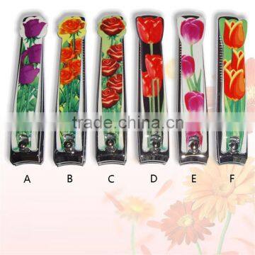 Beautiful nail clipper with flower epoxy cover