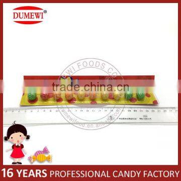 Ball Shape Watermelon Bubble Gum On Paper Ruler photo-2