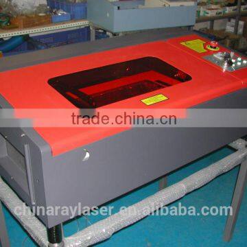 China CNC Most Perfect Laser Die Board MDF WOOD FIRBER Laser Cutting Machine for Package Price Supplier's Choice photo-3