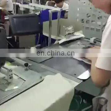 Automatic pocket attaching electronic pattern setter industrial sewing machine