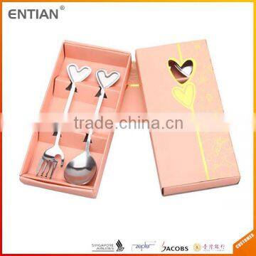 Fork and spoon with gift box