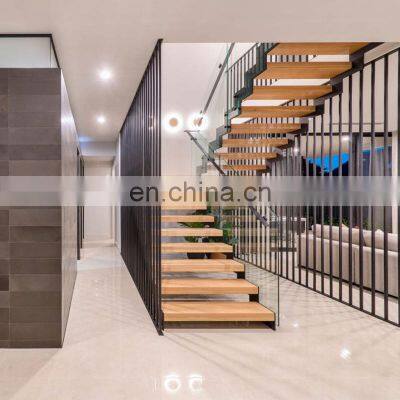 Custom steel balustrade residence timber tread staircase