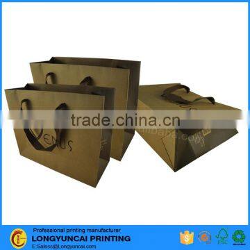 Chinese Factory OEM Food Packaging Round Hole Handle Custom Paper Bag photo-2