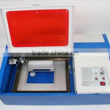 new style DW-3020 stamp laser engraving machine/Cheap desktop rubber stamp laser engraver